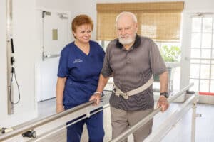 a rehab therapist and resident in the rehab gym of Aviara Healthcare